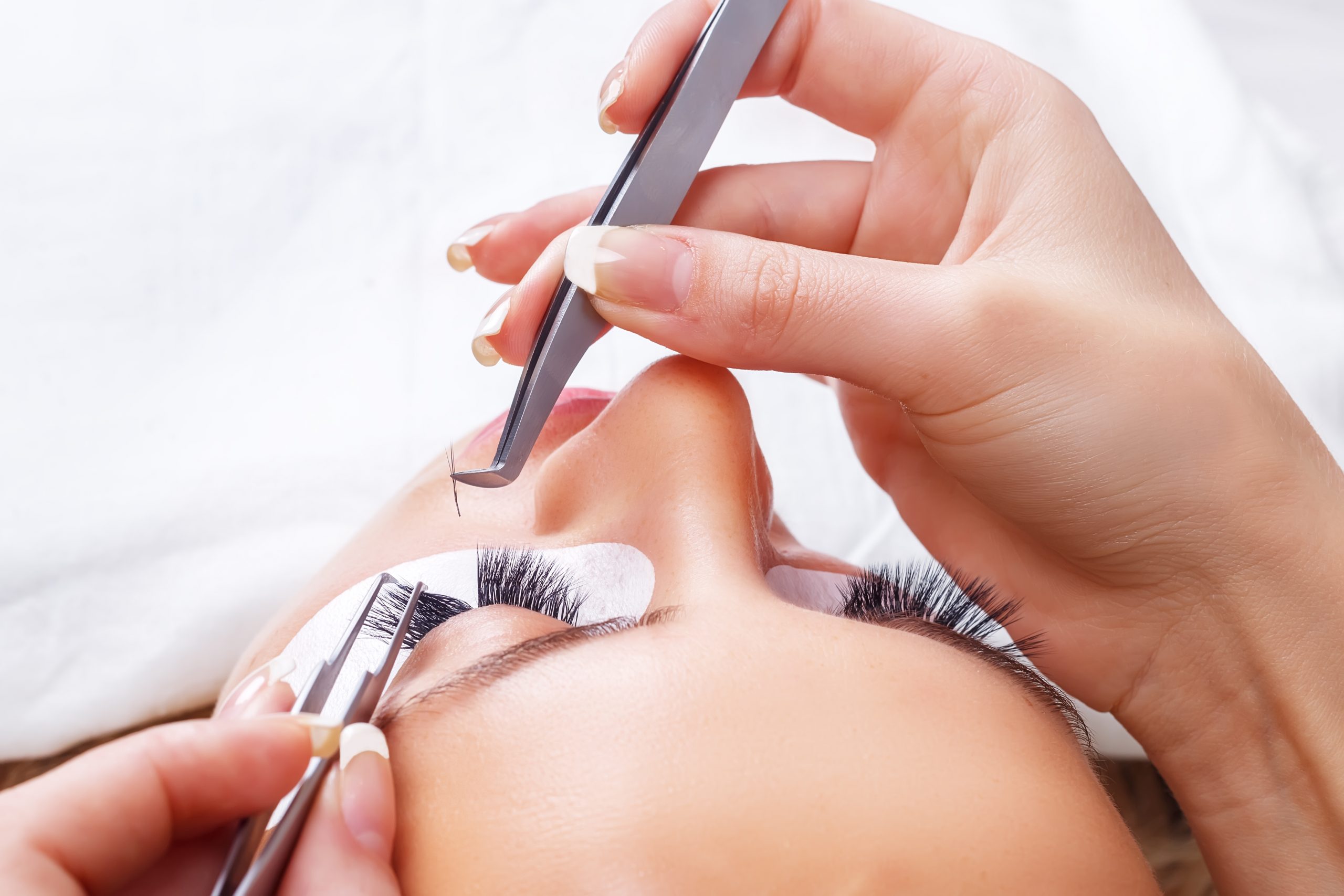 Woman Eye with Long Eyelashes. Eyelash Extension. Lashes. Close up, selected focus